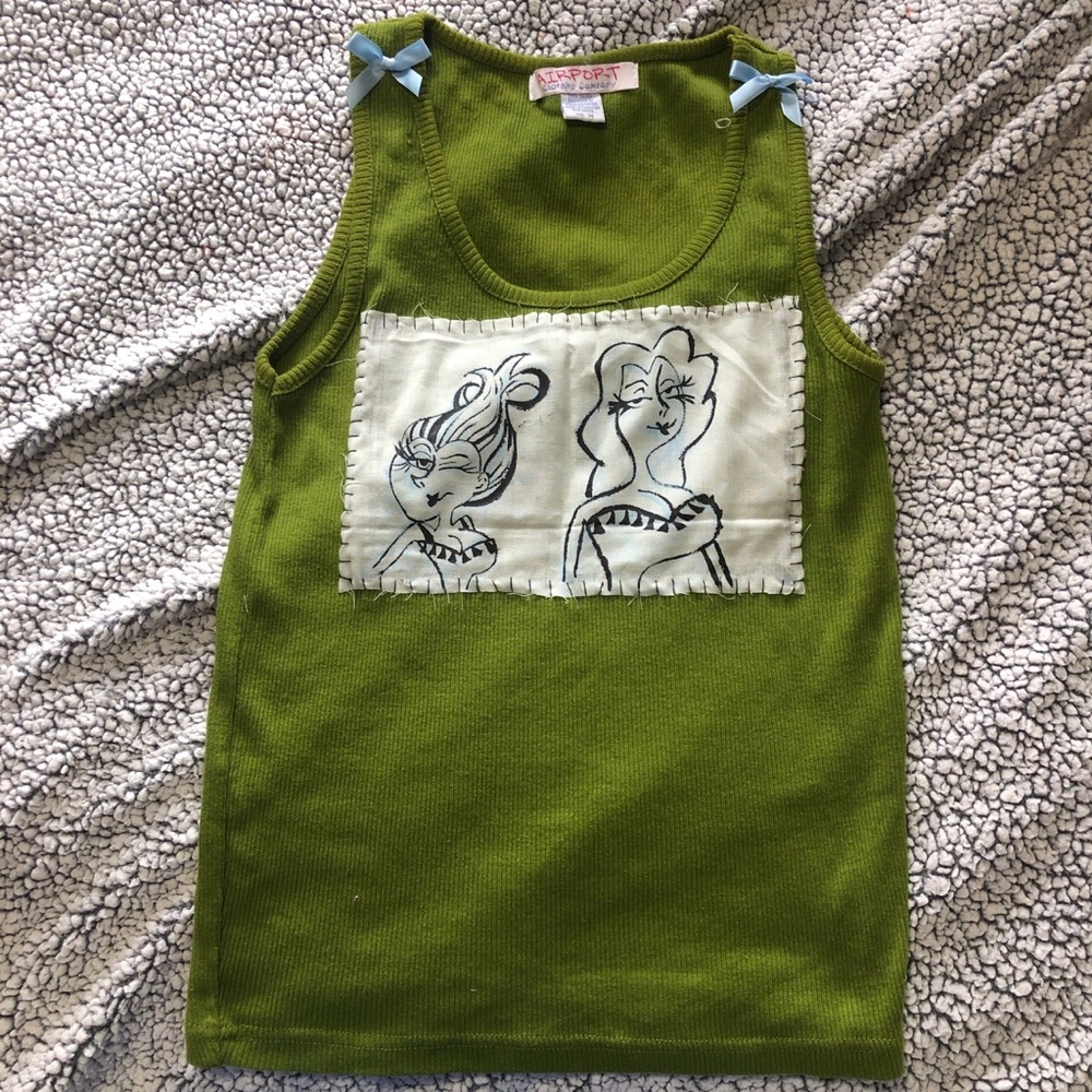 Green and white handmade patch tank top with a unique coraline design